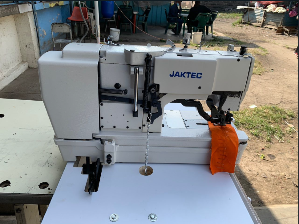 New JAKTEC Button holing machine