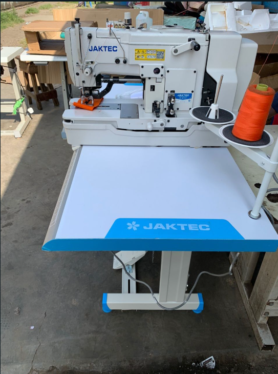 New JAKTEC Button holing machine