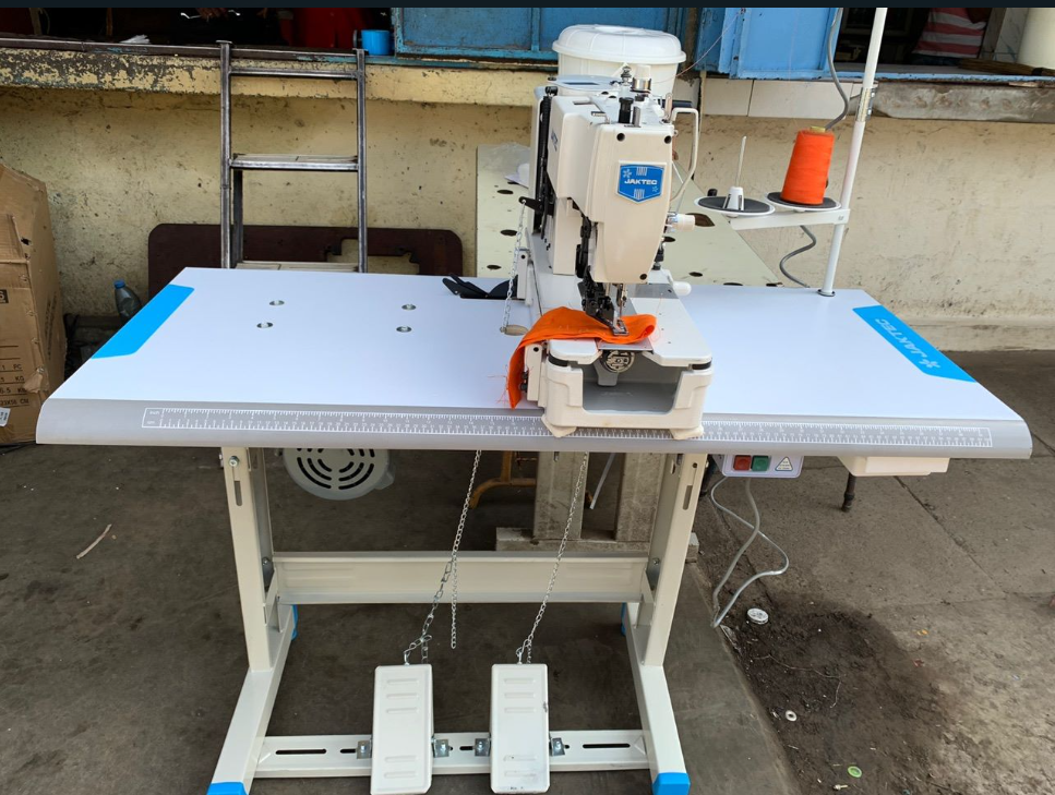 New JAKTEC Button holing machine