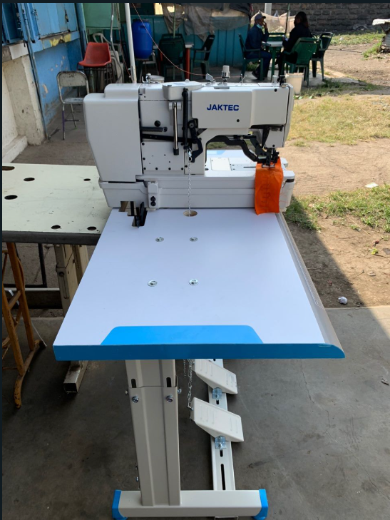 New JAKTEC Button holing machine