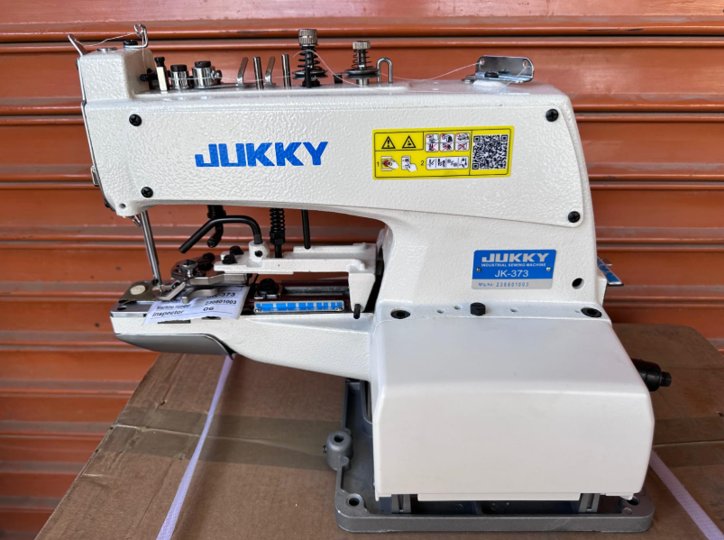 New JUKKY JK_373 button attaching machine.