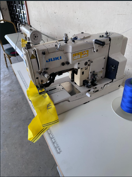 Refurbished JUKI button holing machine