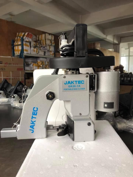 Bag closer machine