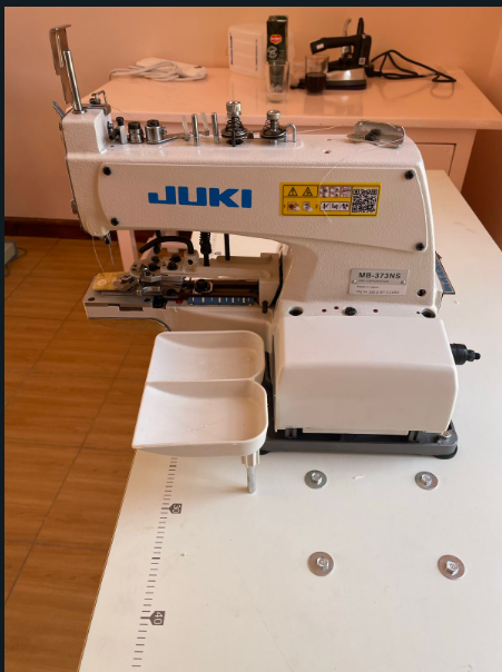 New JUKI MB_373NS button attaching machine